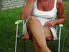 Flashing my mature pussy in the garden